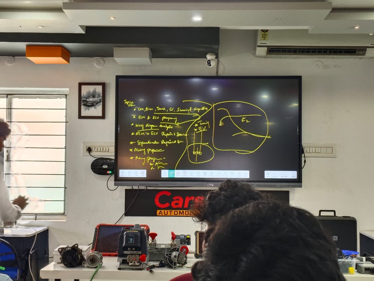 Mechanical Engineering Students Learning Automotive Technologies